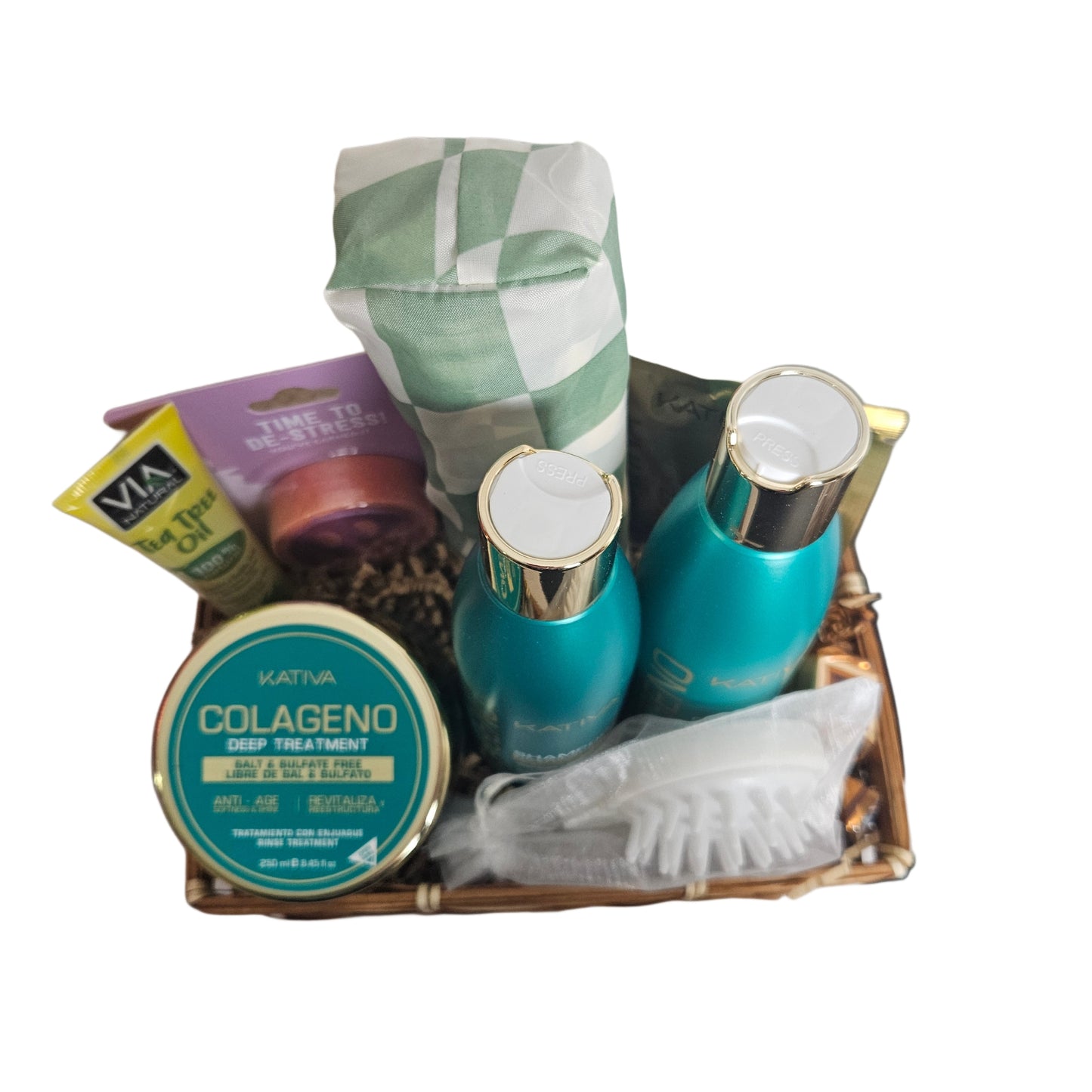 Overhead image of hair care basket. Kativa shampoo, conditioner, hair mask, scalp messager, oil, and shower steamer.